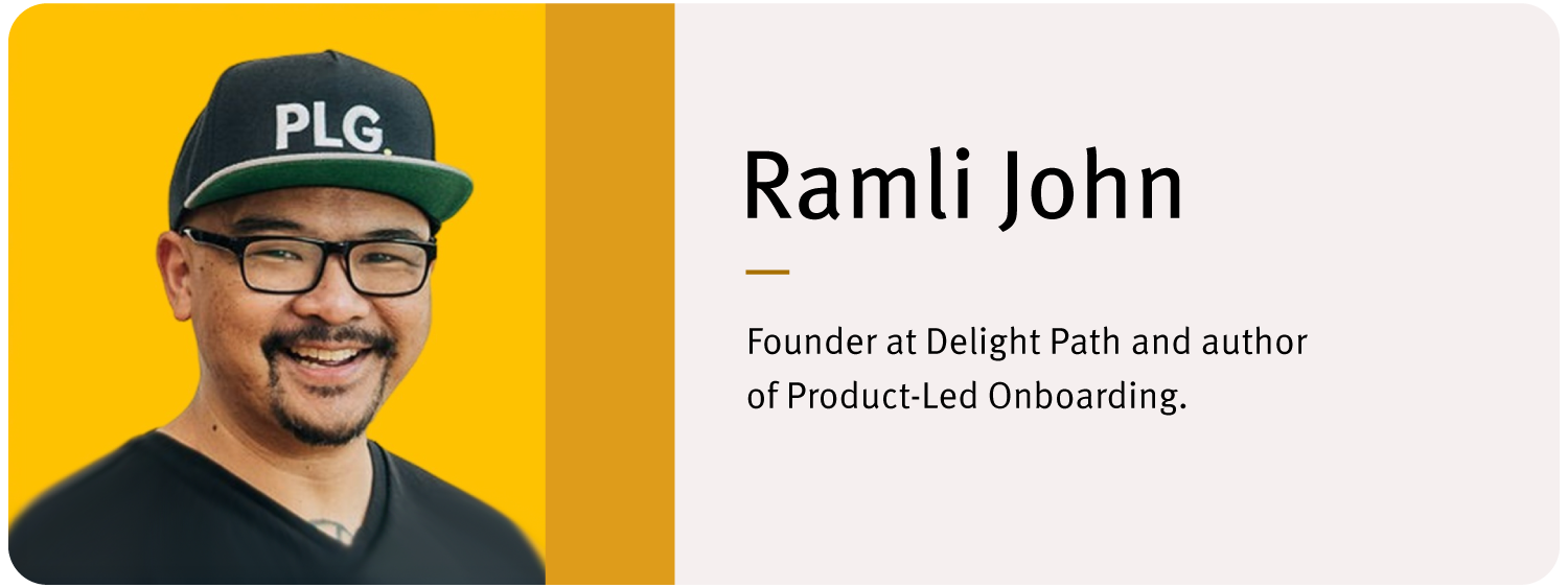 Headshot of Ramli John wearing a black
