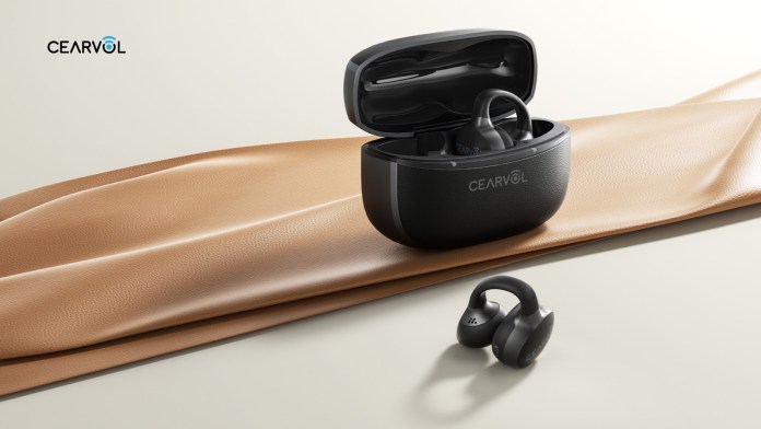 Cearvol Wave hearing aid charging case with touchscreen control and open-ear design, alongside one earbud on a soft leather surface.