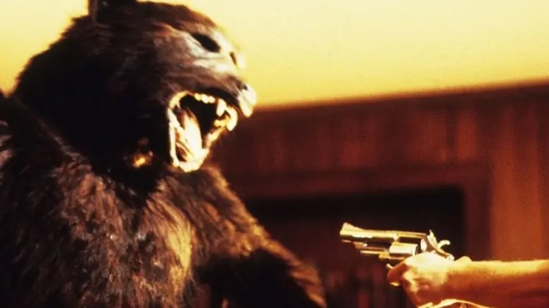 Red points a gun at the werewolf terrorizing the small town in Silver Bullet